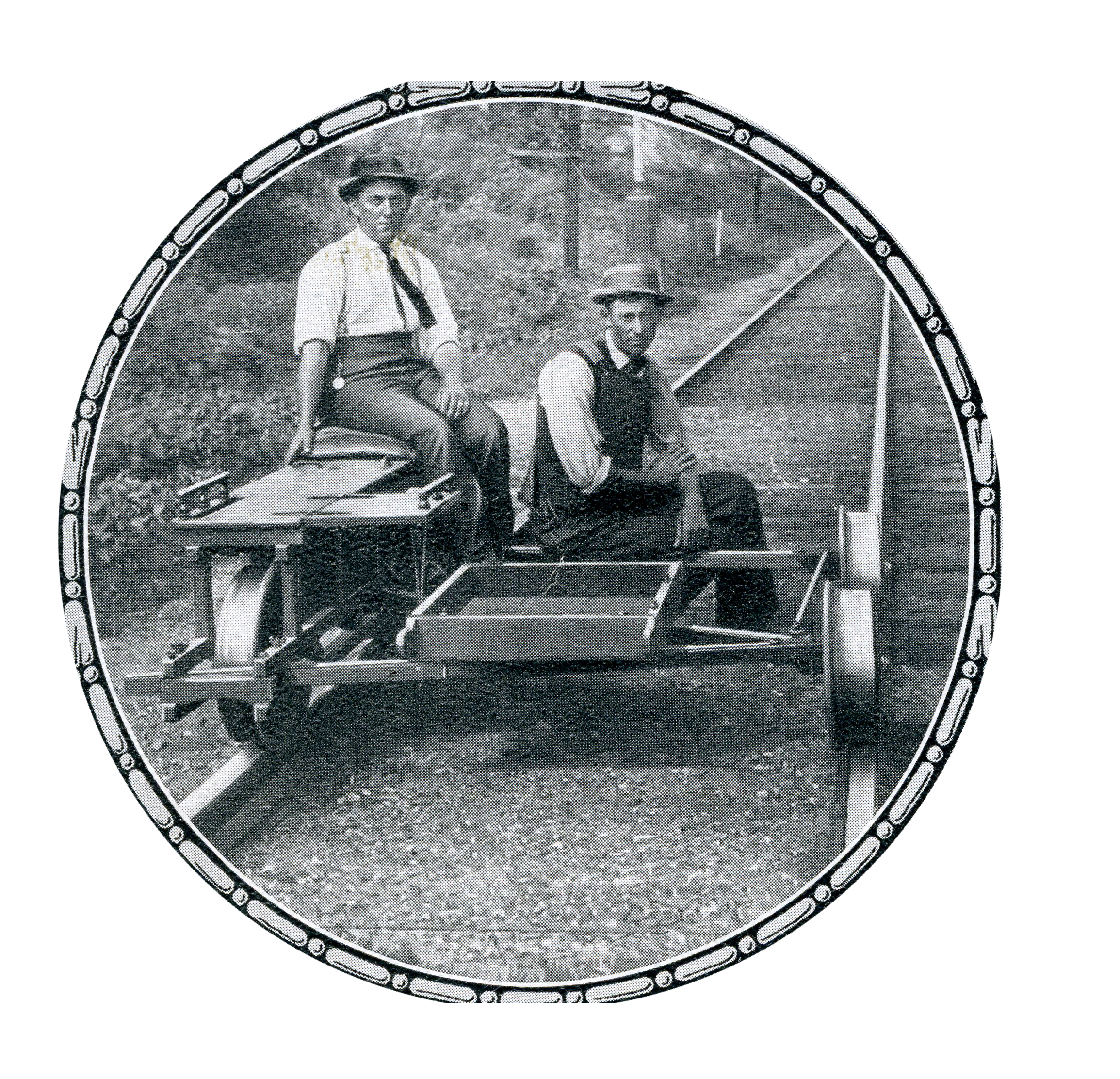 2 well dressed men on an Adams Motorcar, a portable rail vehicle for railway maintenance work.